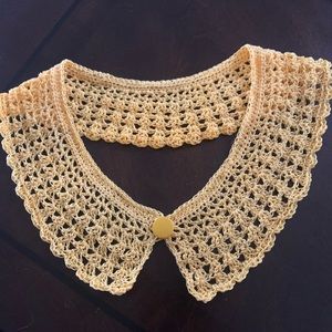Crochet collar accent.